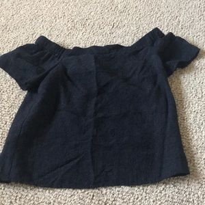 Off the shoulder black short sleeved shirt